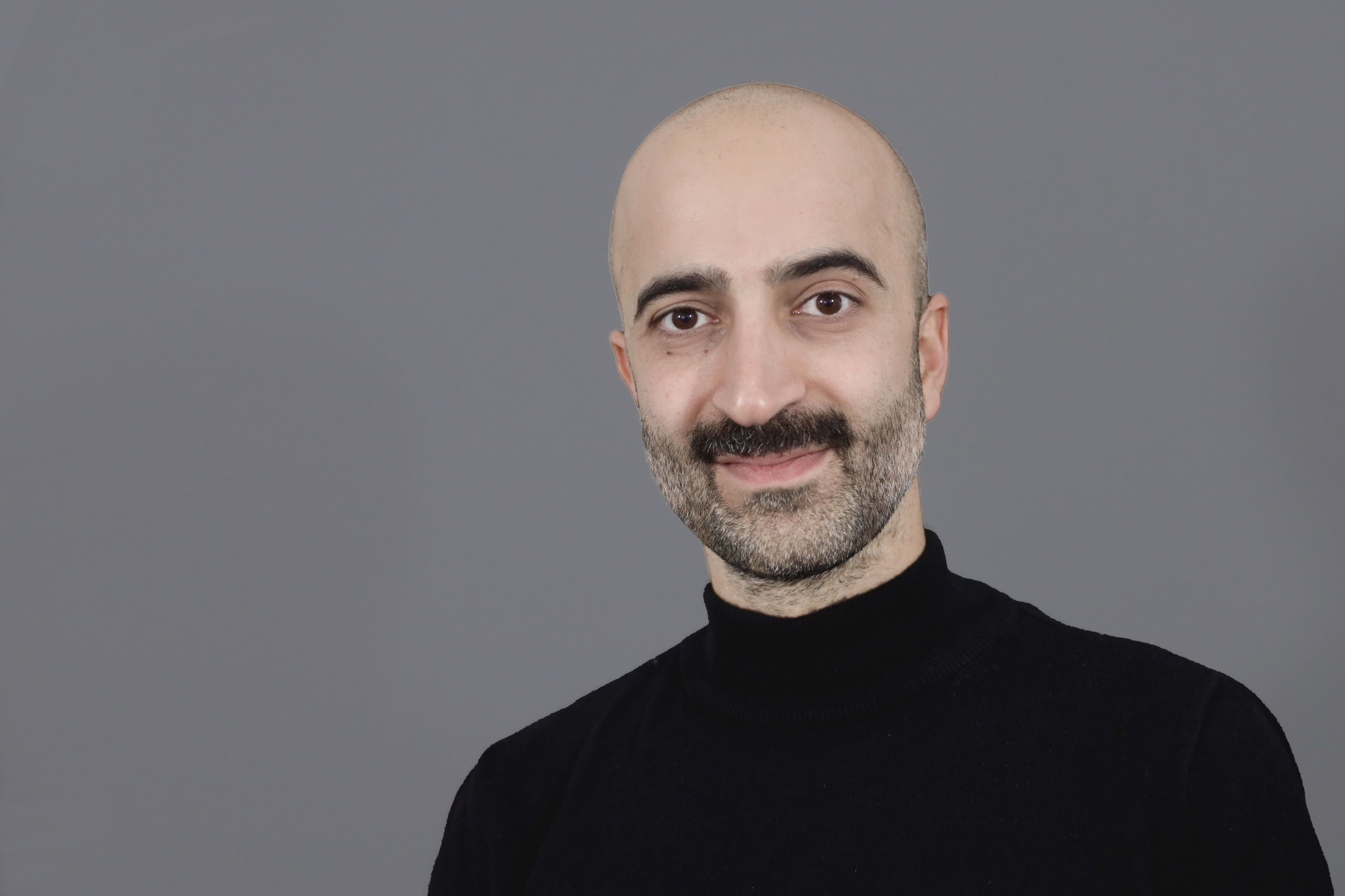 Porträtfoto von Dr. Cihan Çelik